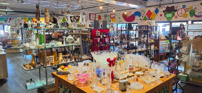 Inside Modern Vintage Marketplace — glassware, vintage finds and a retro mural